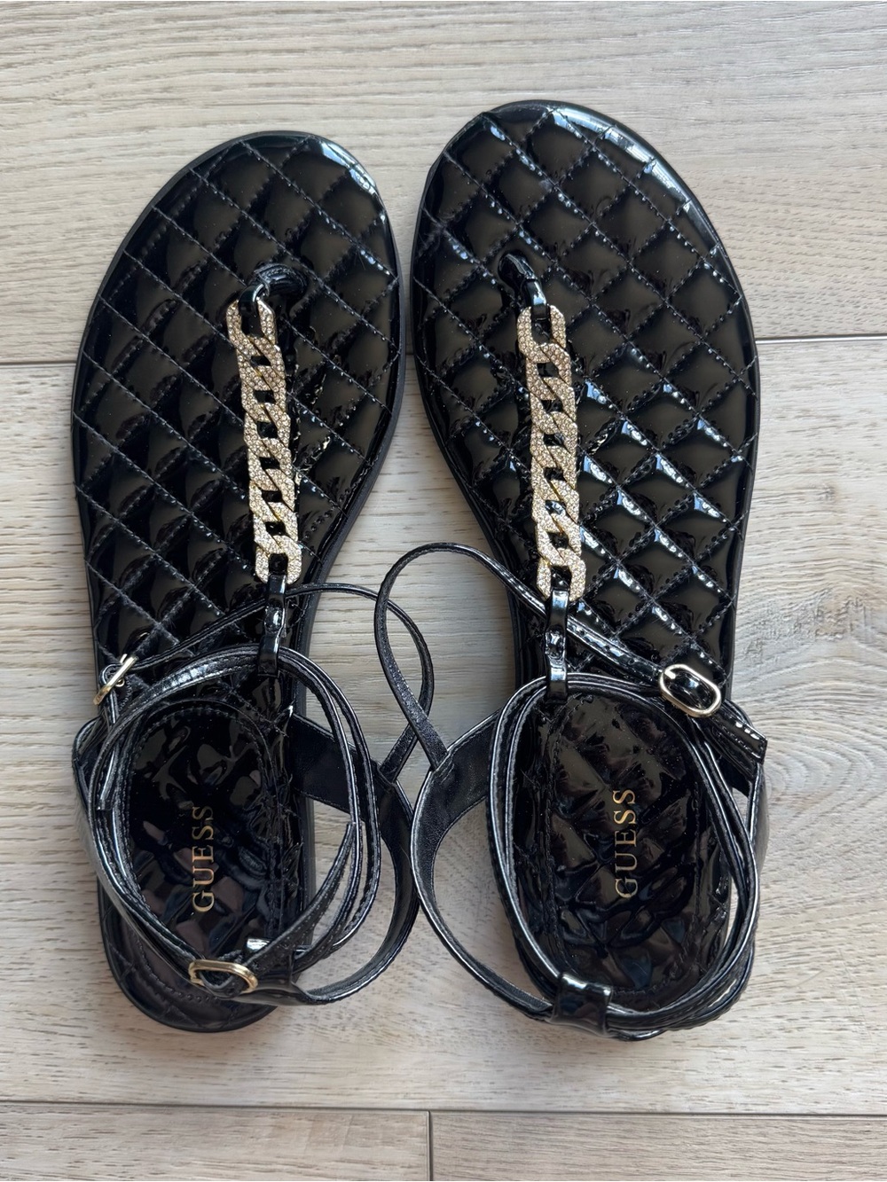 GUESS Black Quilted Patent Sandals with Gold Chain T-Strap